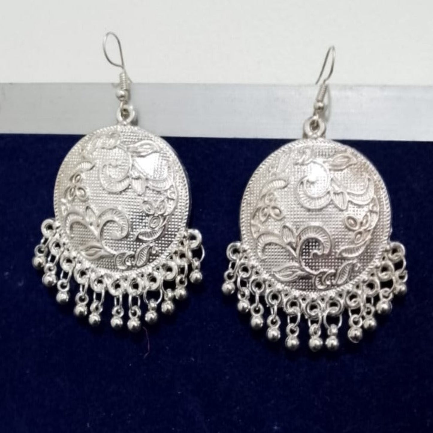silver earing hanging